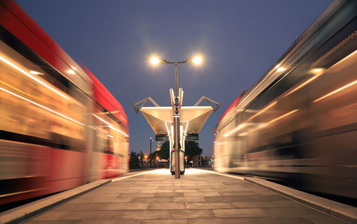 Picture of running trains, taken from a platform